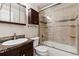 Well-maintained bathroom featuring shower-over-tub, marble counter, and storage, blending functionality with classic design at 3009 Madison Ave # K317, Boulder, CO 80303