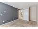 Cozy bedroom featuring neutral carpet, closet, and natural light at 3009 Madison Ave # K317, Boulder, CO 80303