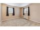 Bedroom with neutral carpet and natural light from windows at 3009 Madison Ave # K317, Boulder, CO 80303