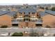 Apartment building exterior featuring brick facade, balconies, and garage parking at 3009 Madison Ave # K317, Boulder, CO 80303