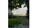 Backyard image shows a vibrant double rainbow over a ball field at 10386 Ravenswood Way, Highlands Ranch, CO 80130