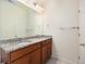 Bathroom features a double sink vanity, granite countertops, and modern fixtures at 5755 S Buchanan Ct # E, Aurora, CO 80016