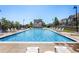 Inviting community pool with lounge chairs, perfect for relaxation and enjoying sunny days at 5755 S Buchanan Ct # E, Aurora, CO 80016