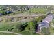 Bird's-eye view of a home with a backyard, deck and proximity to the greenbelt, walking path and park at 17925 E Maplewood Dr, Aurora, CO 80016