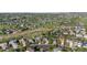 A neighborhood view of a residential area with tree-lined streets, grassy fields, and a clear indication of the address at 17925 E Maplewood Dr, Aurora, CO 80016