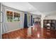 Spacious basement featuring hardwood floors, natural light, and an open layout at 17925 E Maplewood Dr, Aurora, CO 80016