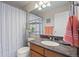 Half-bathroom with a large vanity, neutral walls, and ample lighting at 17925 E Maplewood Dr, Aurora, CO 80016