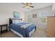 Cozy bedroom with natural light, plush carpets, and a comfortable bed at 17925 E Maplewood Dr, Aurora, CO 80016