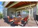 Cozy deck with comfortable seating, a hammock and stylish decor at 17925 E Maplewood Dr, Aurora, CO 80016