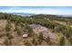 Breathtaking aerial view of the home and property from high atop the mountain at 5197 Bear Mountain Dr, Evergreen, CO 80439
