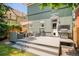 Backyard with a deck including modern outdoor furniture at 2228 N Race St, Denver, CO 80205