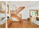 Welcoming foyer with hardwood floors and a beautiful staircase at 2228 N Race St, Denver, CO 80205