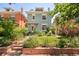 Charming home with a lush, landscaped front yard and welcoming entrance, ideal for curb appeal at 2228 N Race St, Denver, CO 80205