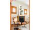 Cozy living room featuring a fireplace, reading nook and wood trim details at 2228 N Race St, Denver, CO 80205