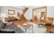 Open living room with hardwood floors and an open staircase at 2228 N Race St, Denver, CO 80205