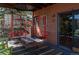 Back deck with covered ski lift chairs and unique outdoor decor at 783 Calgary Way, Golden, CO 80401