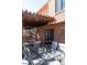 Back deck includes a dining table and hanging ski lift chair at 783 Calgary Way, Golden, CO 80401