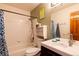 Full bathroom with shower/tub combination and modern single sink vanity at 783 Calgary Way, Golden, CO 80401
