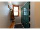 Functional mudroom features coat racks, bench, and multiple lockers, perfect for storing outdoor gear at 783 Calgary Way, Golden, CO 80401