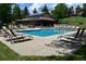 Inviting community pool with lounge chairs, ideal for relaxation and outdoor fun on sunny days at 783 Calgary Way, Golden, CO 80401