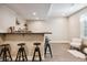 Finished basement bar with seating and plenty of storage at 147 Chapel Hill Cir, Brighton, CO 80601