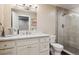 Clean bathroom with a walk-in shower and modern vanity at 147 Chapel Hill Cir, Brighton, CO 80601