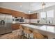 Modern kitchen with stainless steel appliances and large island at 147 Chapel Hill Cir, Brighton, CO 80601