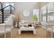 Spacious living room with large windows, and comfortable seating area at 147 Chapel Hill Cir, Brighton, CO 80601
