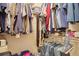 Walk-in closet with shelving and hanging space for clothing and accessories at 7160 S Wenatchee Way # F, Aurora, CO 80016