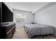 The bedroom features a serene color palette and plenty of natural light at 12816 Ironstone Way # 203, Parker, CO 80134
