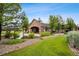 Charming clubhouse with landscaped entrance offers a welcoming space for community gatherings at 12816 Ironstone Way # 203, Parker, CO 80134