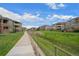 Well-maintained community with walking path and landscaping provides a serene living environment at 12816 Ironstone Way # 203, Parker, CO 80134