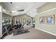 Fitness center with exercise machines, free weights, and ample space for workouts at 12816 Ironstone Way # 203, Parker, CO 80134