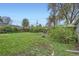 Large backyard with mature trees and plenty of space for outdoor activities at 6260 W 45Th Pl, Wheat Ridge, CO 80033