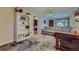 Bright living room with hardwood floors, a comfortable sofa, and seamless transitions to adjacent rooms at 6260 W 45Th Pl, Wheat Ridge, CO 80033