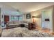 Spacious living room featuring hardwood floors, comfortable seating, and stylish decor at 6260 W 45Th Pl, Wheat Ridge, CO 80033