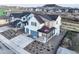 Spacious two-story home showcasing the neighborhood and surrounding landscape with a view of the mountains at 875 Coal Bank Trl, Castle Rock, CO 80104