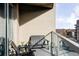 Cozy balcony with comfortable seating, an outdoor rug, and a view of the city skyline at 4200 W 17Th Ave # 419, Denver, CO 80204