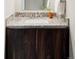 Bathroom with a dark wood vanity, modern sink, and stylish faucet at 4200 W 17Th Ave # 419, Denver, CO 80204