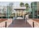 The building features a modern entryway with glass walls, a stone walkway, and signage for 'Lakehouse' at 4200 W 17Th Ave # 419, Denver, CO 80204