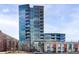 Modern high-rise exterior showcasing sleek glass facade, multiple balconies, and contemporary architectural design at 4200 W 17Th Ave # 419, Denver, CO 80204