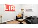 Chic living room with stylish decor, unique artwork, and plenty of comfortable seating at 4200 W 17Th Ave # 419, Denver, CO 80204
