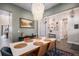 Cozy dining area with chandelier lighting and tasteful decor at 9380 Bear River St, Littleton, CO 80125