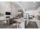 Modern kitchen with a spacious island, stainless steel appliances, and an open layout to the living area at 9380 Bear River St, Littleton, CO 80125