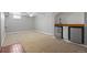 Spacious basement with carpet and a stainless steel mini-fridge at 2582 S Uno Way, Denver, CO 80219