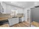 Well-equipped kitchen with stainless steel appliances, granite countertops, and ample cabinet space at 2582 S Uno Way, Denver, CO 80219