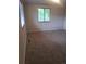 Bright bedroom with large windows offering scenic views and plenty of natural light at 6207 W 92Nd Pl, Westminster, CO 80031