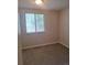 Bedroom with window, neutral paint, carpet and natural light at 6207 W 92Nd Pl, Westminster, CO 80031