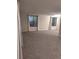 Spacious living room with neutral carpet, white walls and natural light at 6207 W 92Nd Pl, Westminster, CO 80031