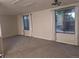 Spacious living room with neutral carpet, white walls and natural light at 6207 W 92Nd Pl, Westminster, CO 80031